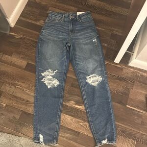 New with tags. American eagle Curvy Mom jean. Super high rise. Size 0